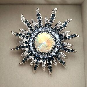 Silver and Blue Starburst Sun Brooch Pin